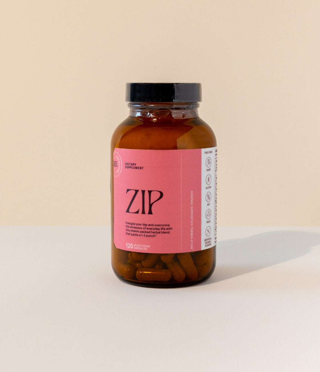 Energize your day and overcome stressors of everyday life with this vitamin packed herbal blend that packs a 1–2 punch. [AD: A 120 capsule bottle of Zip with a pink label sits on a plain yellow and cream backdrop]